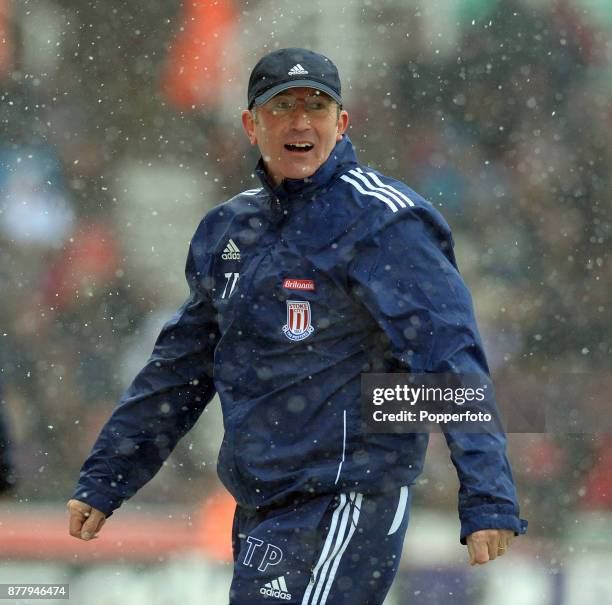Stoke City manager Tony Pulis during the Barclays Premier League match between Stoke City and Sunderland as the snow falls at the Britannia Stadium...
