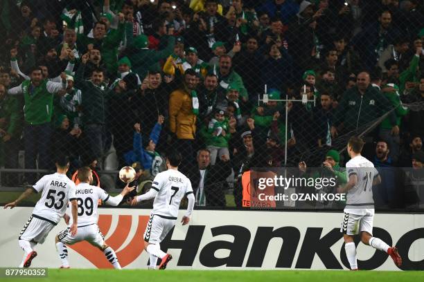 Konyaspor's Nejc Skubic celebrates with his team mates after scoring a goal during the UEFA Europa League Group I football match between Konyaspor...