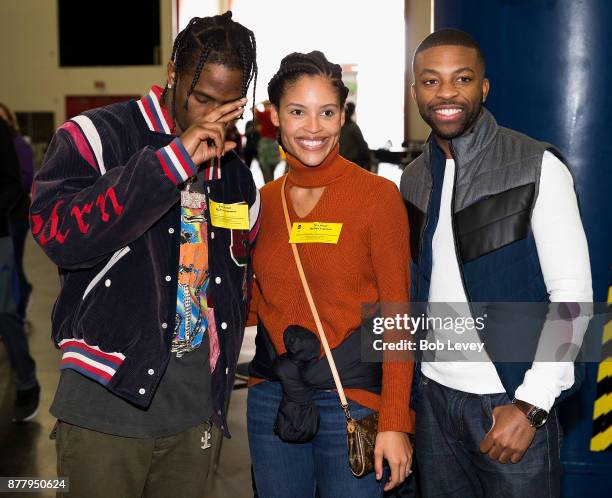 Travis Scott helps distribute clothing during the Houston City Wide Club of Clubs Turkey Drive on November 23, 2017 in Houston, Texas.