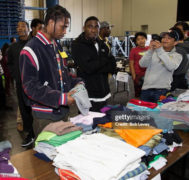 Travis Scott helps distribute clothing during the Houston City Wide Club of Clubs Turkey Drive on November 23, 2017 in Houston, Texas.