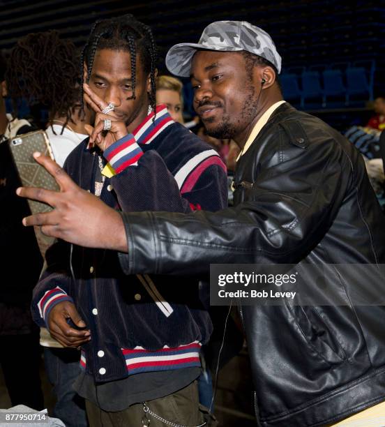 Travis Scott helps distribute clothing during the Houston City Wide Club of Clubs Turkey Drive on November 23, 2017 in Houston, Texas.