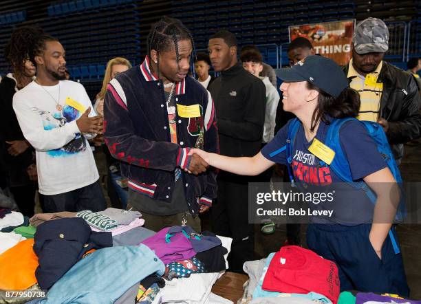 Travis Scott helps distribute clothing during the Houston City Wide Club of Clubs Turkey Drive on November 23, 2017 in Houston, Texas.