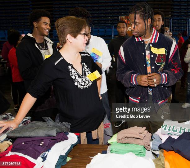 Travis Scott helps distribute clothing during the Houston City Wide Club of Clubs Turkey Drive on November 23, 2017 in Houston, Texas.