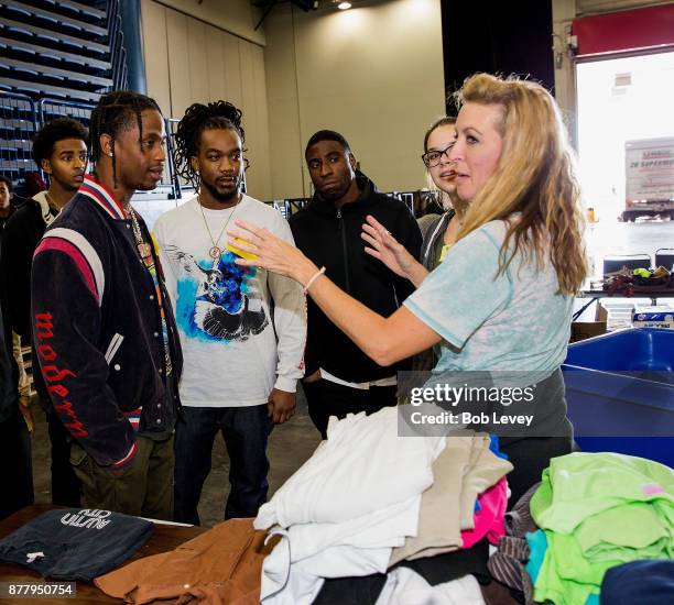 Travis Scott helps distribute clothing during the Houston City Wide Club of Clubs Turkey Drive on November 23, 2017 in Houston, Texas.