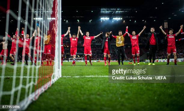 Players of Koeln celebrate their win after the UEFA Europa League group H match between 1. FC Koeln and Arsenal FC at RheinEnergieStadion on November...