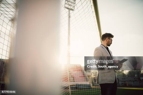 coach examining the game - sport manager stock pictures, royalty-free photos & images