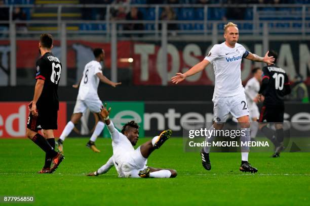 Austria Wien players celebrate after scoring the UEFA Europa League group D football match between AC Milan and FK Austria-Wien at the San Siro...