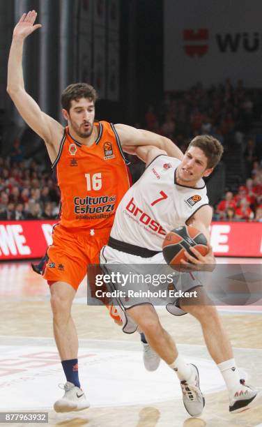 Aleksej Nikolic, #7 of Brose Bamberg competes with Guillem Vives, #16 of Valencia Basket in action during the 2017/2018 Turkish Airlines EuroLeague...