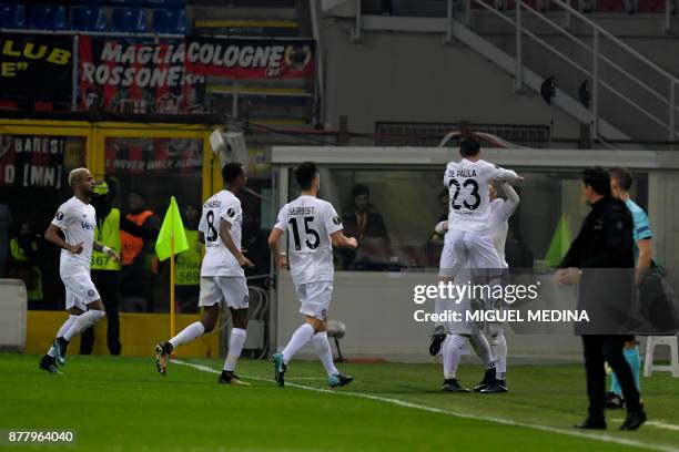 Austria Wien players celebrate after scoring the UEFA Europa League group D football match between AC Milan and FK Austria-Wien at the San Siro...