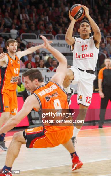 Maodo Lo, #12 of Brose Bamberg competes with Sam Van Rossom, #9 of Valencia Basket in action during the 2017/2018 Turkish Airlines EuroLeague Regular...