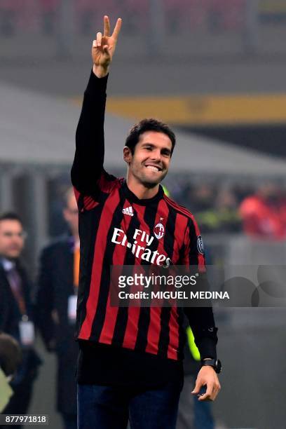 Former AC Milan's player Kaka greets fans during the UEFA Europa League group D football match between AC Milan and FK Austria-Wiendur at the San...