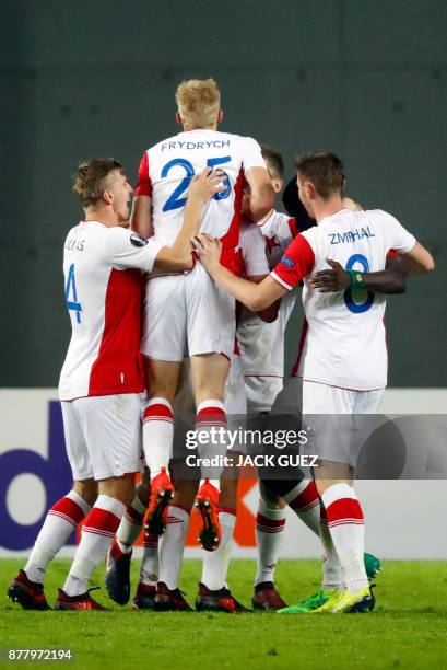 Slavia's players celebrate their second goal during the Europa League Group A football match between Maccabi Tel Aviv and Slavia Prague on November...