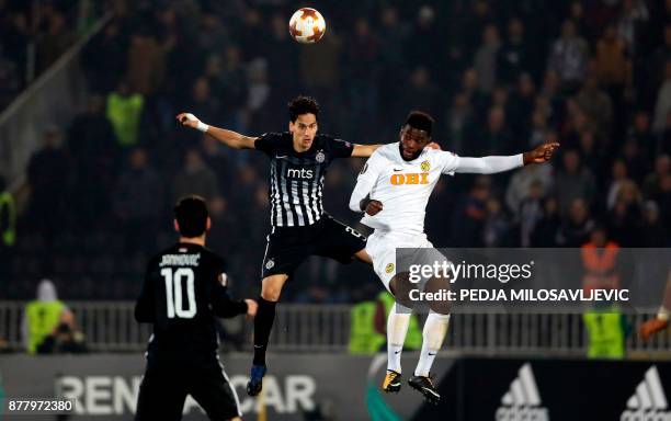 Partizan's Marko Jevtovic vies with Young Boys' Jean-Pierre Nsame during the UEFA Europa League football match between Partizan Belgrade and BSC...