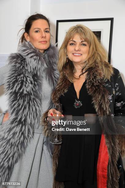 Christina Estrada and Carole Ashby attend a private view of Koo Stark's exhibition 'Kintsugi Portraits' at Galleria San Lorenzo on November 23, 2017...