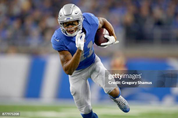 Marvin Jones of the Detroit Lions runs with ball after catching a pass against the Minnesota Vikings during the first half at Ford Field on November...