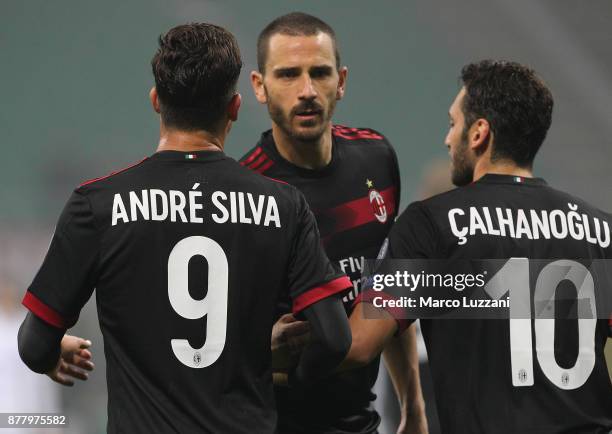 Andre Silva of AC Milan celebrates his goal with his team-mates Leonardo Bonucci and Hakan Calhanoglu during the UEFA Europa League group D match...