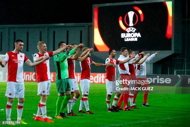 Slavia's players greet their fans following the Europa League Group A football match between Maccabi Tel Aviv and Slavia Prague on November 23 at the...