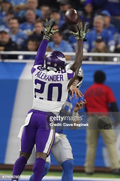 Mackensie Alexander of the Minnesota Vikings tries to block a pass from Matthew Stafford of the Detroit Lions during an NFL game at Ford Field on...
