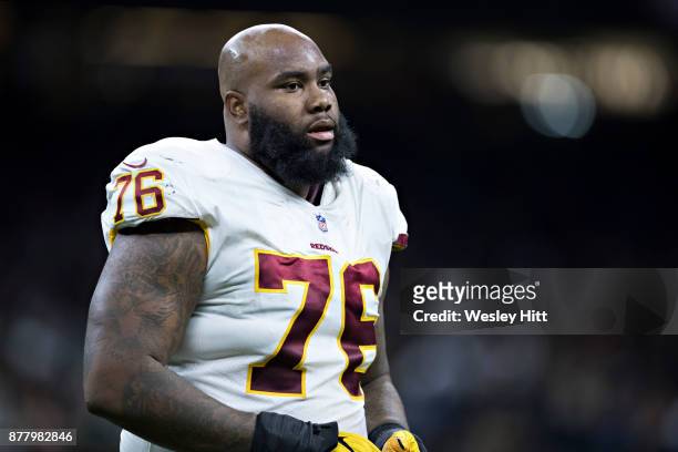 Morgan Moses of the Washington Redskins walks to the sidelines during a game against the New Orleans Saints at Mercedes-Benz Superdome on November...