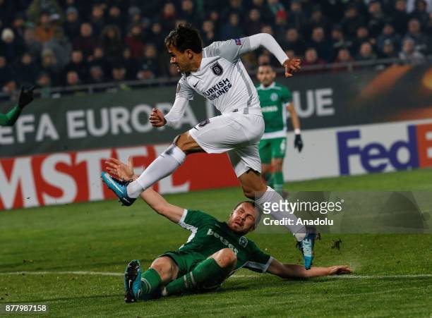 Mossoro of Medipol Basaksehir in action against Cosmin Moti of Ludogorets during the UEFA Europa League Group C soccer match between Ludogorets and...