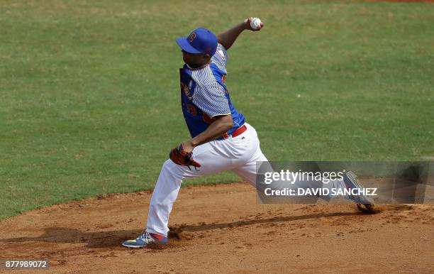 Pitcher David Santamaria of Colombia throws during the third inning of the men's final baseball game against Panama at the XVIII Bolivarian Games in...