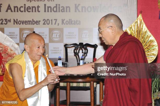 Holiness The Dalai Lama Lighting a lamp at the Indian chamber of Commerce Program of &quot;His Holiness the Dalai Lama Speaks on &quot;Revival of...