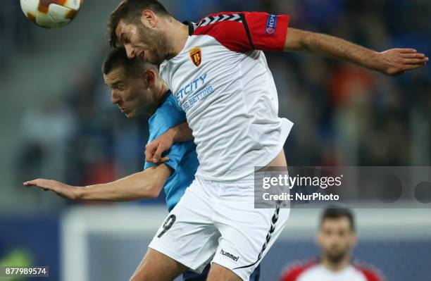 Dmitri Poloz of FC Zenit Saint Petersburg and Hovhannes Hambartsumyan of FC Real Sociedad vie for the ball during the UEFA Europa League Group L...