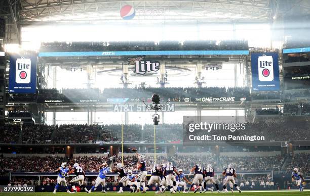 Dak Prescott of the Dallas Cowboys passes the ball to an open receiver against the the Los Angeles Chargers during a Thanksgiving Day game at AT&T...