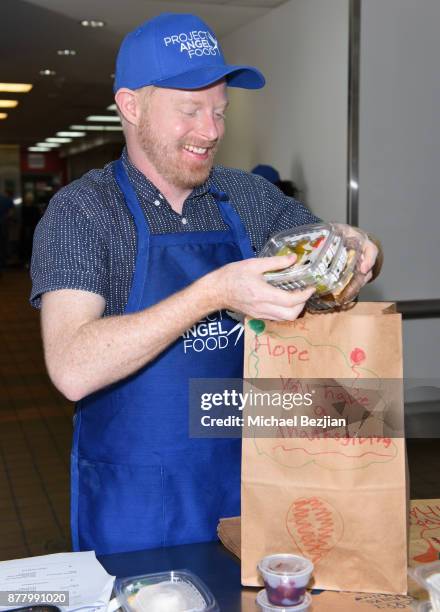 Jesse Tyler Ferguson volunteers for Thanksgiving Day at Project Angel Food on November 23, 2017 in Los Angeles, California.