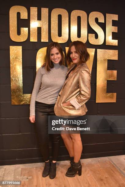 Camilla Thurlow and Caroline Flack attend the launch of the Help Refugees 'Choose Love' pop-up shop on November 23, 2017 in London, England.