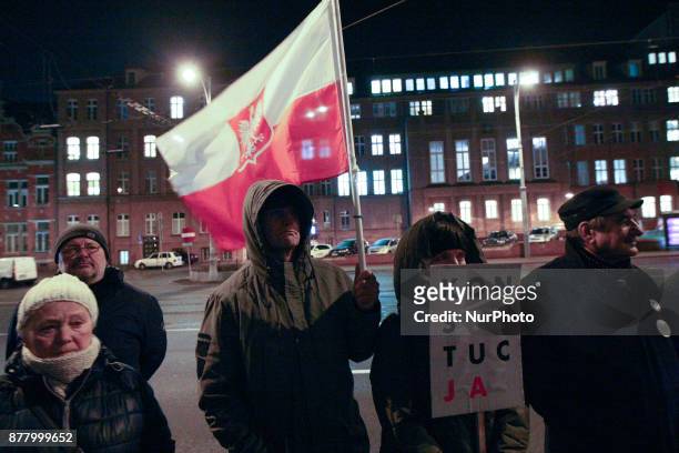 People holding European Union and Polish flags, and wearing t-shirts with ' Constitution ' inscription are seen in Gdansk, Poland on 23 November 2017...