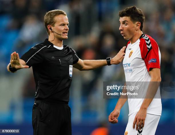 Evgenii Novak of FK Vardar reacts as the referee Bart Vertenten gestures during the UEFA Europa League Group L match between FC Zenit St. Petersburg...