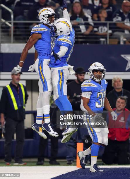 Tyrell Williams of the Los Angeles Chargers and Keenan Allen of the Los Angeles Chargers celebrate Williams' third quarter touchdown against the...
