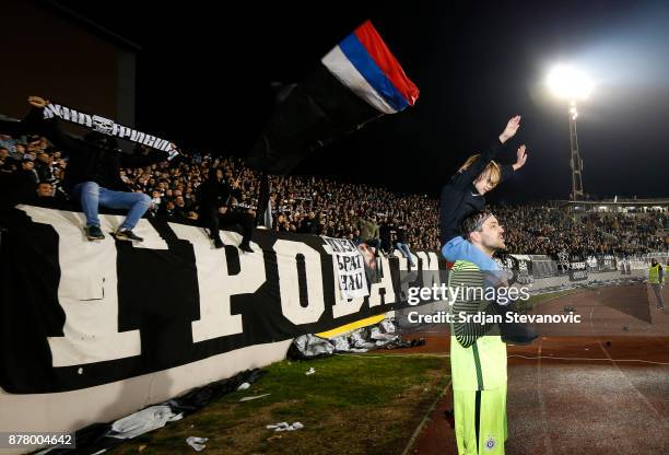 Goalkeeper Vladimir Stojkovic celebrates with his son Lav after the UEFA Europa League group B match between Partizan and BSC Young Boys at Stadium...