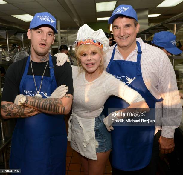 Aaron Carter, Charo and Richard Ayoub volunteer for Thanksgiving Day at Project Angel Food on November 23, 2017 in Los Angeles, California.