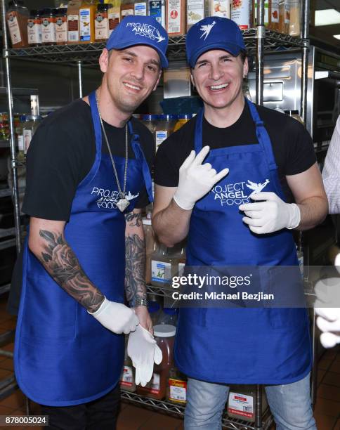 Aaron Carter and Hal Sparks volunteer for Thanksgiving Day at Project Angel Food on November 23, 2017 in Los Angeles, California.