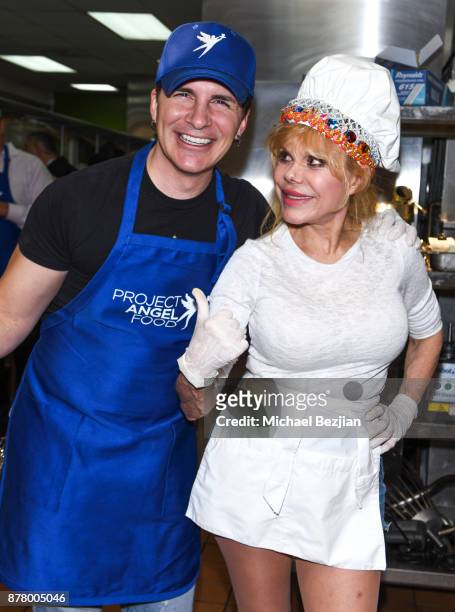 Hal Sparks and Charo volunteer for Thanksgiving Day at Project Angel Food on November 23, 2017 in Los Angeles, California.