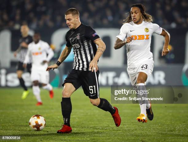 Ognjen Ozegovic of Partizan in action against Kevin Mbabu of Young Boys during the UEFA Europa League group B match between Partizan and BSC Young...