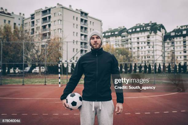 soccer player - street football stock pictures, royalty-free photos & images