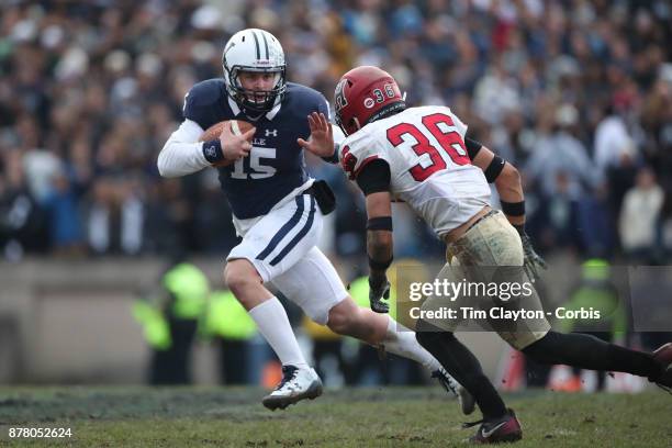 Jordan Carey of Yale challenged by Tanner Lee of Harvard during the Yale V Harvard, Ivy League Football match at the Yale Bowl. Yale won the game...