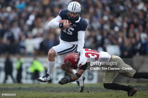 Jordan Carey of Yale challenged by Tanner Lee of Harvard during the Yale V Harvard, Ivy League Football match at the Yale Bowl. Yale won the game...