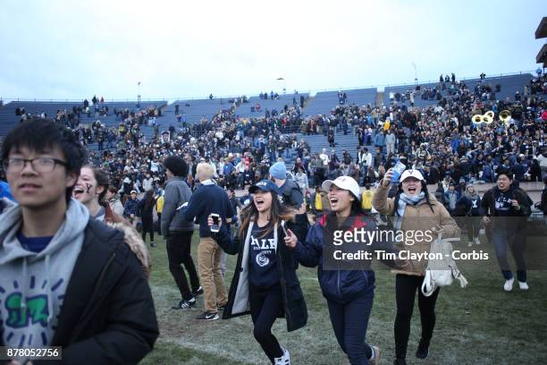 Yale fans celebrate victory after the Yale V Harvard, Ivy League Football match at the Yale Bowl. Yale won the game 24-3 to win their first outright...