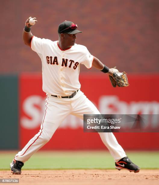 Edgar Renteria of the San Francisco Giants throws the ball to first base during their game against the Washington Nationals at AT&T Park on May 13,...