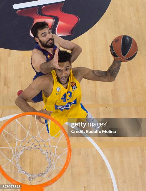 Jonah Bolden, #43 of Maccabi Fox Tel Aviv competes with Pierre Oriola, #18 of FC Barcelona Lassa during the 2017/2018 Turkish Airlines EuroLeague...