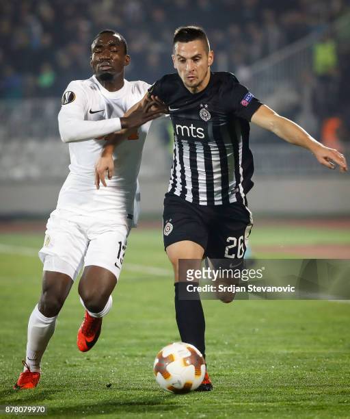 Nemanja Miletic of Partizan in action against Nicolas Moumi Ngamaleu of Young Boys during the UEFA Europa League group B match between Partizan and...