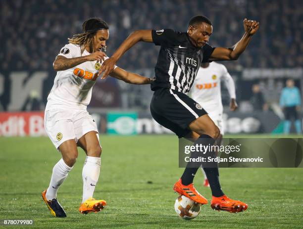 Leandre Tawamba of Partizan in action against Kevin Mbabu of Young Boys during the UEFA Europa League group B match between Partizan and BSC Young...