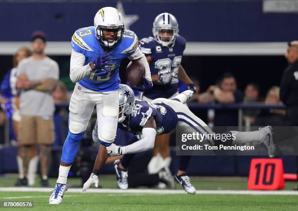 Keenan Allen of the Los Angeles Chargers breaks tackle by Anthony Brown of the Dallas Cowboys on a touchdown run in the fourth quarter at AT&T...