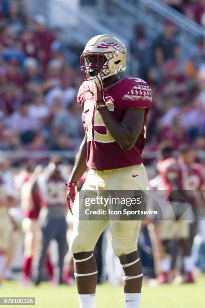 Florida State Seminoles linebacker Leonard Warner prepares for a play during the game between the Delaware State Hornets and the Florida State...