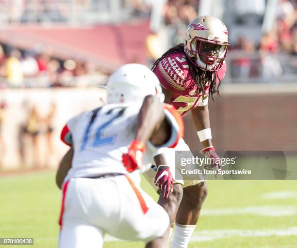 Florida State defensive back Herbans Paul eyes Delaware State Hornets wide receiver Taronn Selby during the game between the Delaware State Hornets...