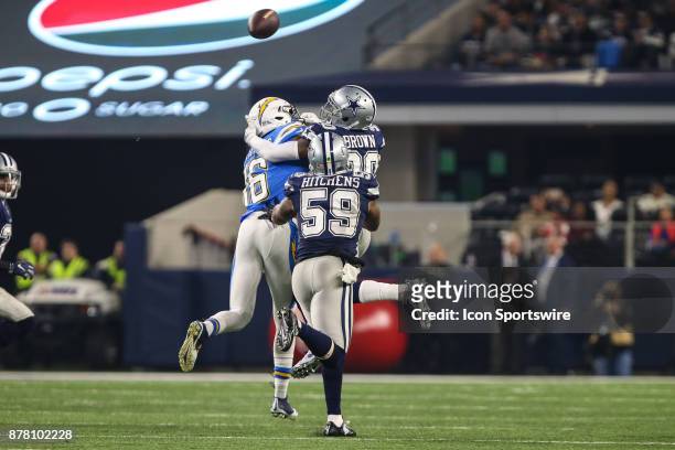 Los Angeles Chargers wide receiver Tyrell Williams , Dallas Cowboys cornerback Anthony Brown and Dallas Cowboys linebacker Anthony Hitchens battle...